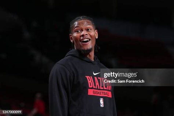 Cam Reddish Smiles With A Fan (And Possible Future Rival)
