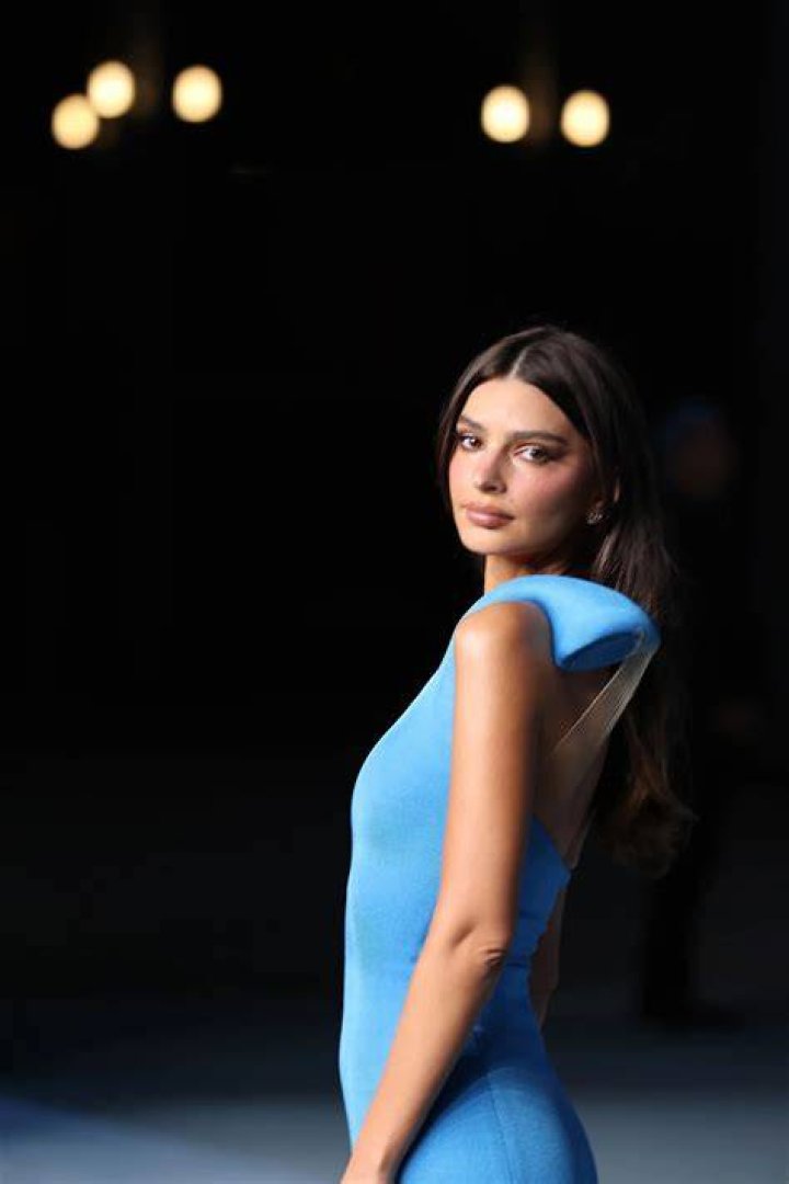 EXCLUSIVE: Emily Ratajkowski puts her baby bump on display in an Inamorata bikini as she enjoys a day on the beach with her hubby Sebastian Bear and a friend. The pregnant model enjoyed the California sunshine only days before Christmas. Emily kept warm with a Inamorata hoodie as the group walked around on the sand. 20 Dec 2020 Pictured: Emily Ratajkowski puts her baby bump on display in an Inamorata bikini. Photo credit: Rachpoot/MEGA TheMegaAgency.com +1 888 505 6342 (Mega Agency TagID: MEGA722252_005.jpg) [Photo via Mega Agency]