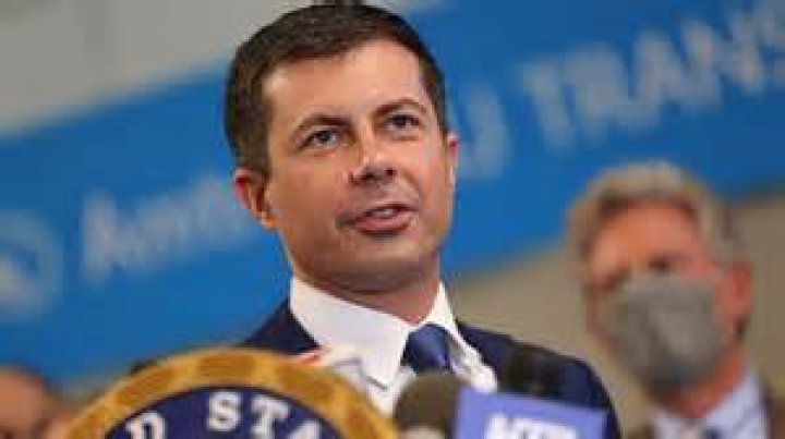 Mayor Pete Buttigieg listens to an AP reporter at Farmers Market in South Bend, Ind., . At 37, Pete Buttigieg is just a few years older than the minimum age required to serve as president of the United States US Election 2020 Fresh Faces, South Bend, USA - 10 Jan 2019