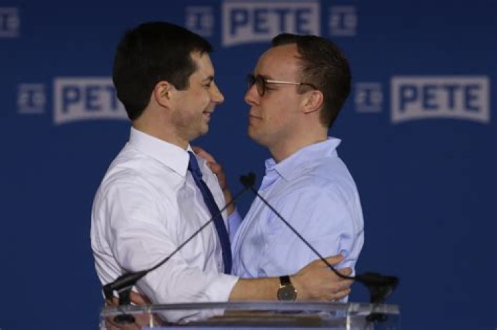 Pete Buttigieg, Chasten Glezman. Democratic presidential candidate former South Bend, Ind., Mayor Pete Buttigieg, left, is joined by his husband Chasten Glezman after speaking to supporters at a caucus night rally in Des Moines, IowaElection 2020 Pete Buttigieg, Des Moines, USA - 03 Feb 2020